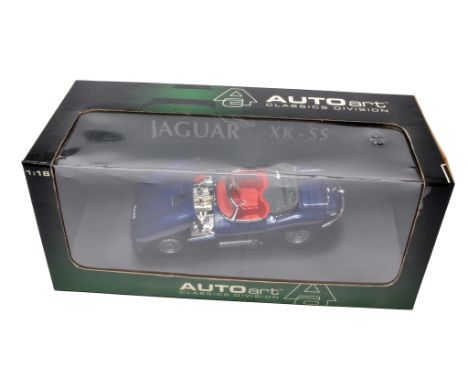 Autoart 1/18 diecast scale model comprising a Jaguar XK-SS. Excellent and secure in box. 