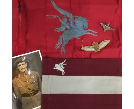 A 1st Airborne Division staff car pennant depicting Pegasus, a silk flag also depicting Pegasus (in poor condition), two Para