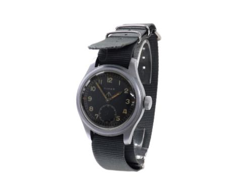 Timor British Military issue stainless steel gentleman's wristwatch, circular black dial with Miliary arrow, Arabic numerals,