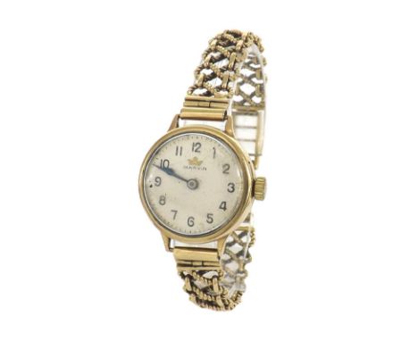Marvin 9ct lady's bracelet watch, 31.6gm, 26mm - Condition Report: - Movement - currently working. Dial - surface marks. Glas