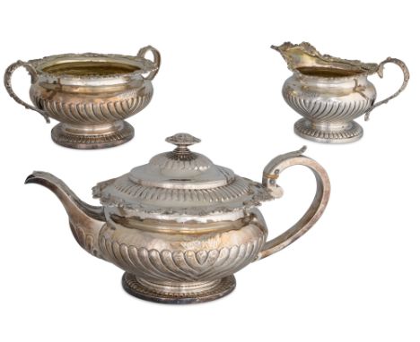 A GEORGE III SILVER THREE PIECE TEA SERVICE, London 1818, 1573 g.