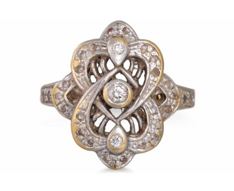 A SHAPED DIAMOND CLUSTER RING, mounted in 18ct yellow gold, of openwork design, size H - I