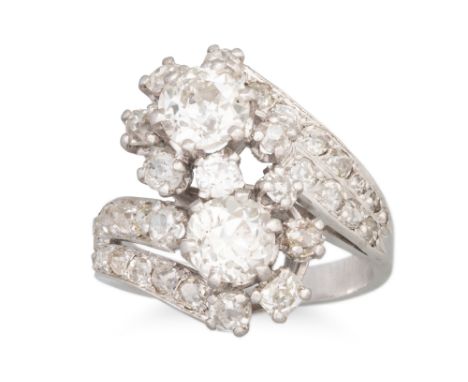 A VINTAGE DIAMOND CLUSTER RING, the old cut diamonds with old cut diamond surround, cross over design with diamond set should