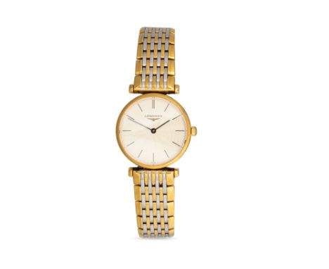 A LADY'S LONGINES ULTRA SLIM CLASSIC WRISTWATCH, two-tone bracelet strap, baton markers, engine turned decoration to dial, ca