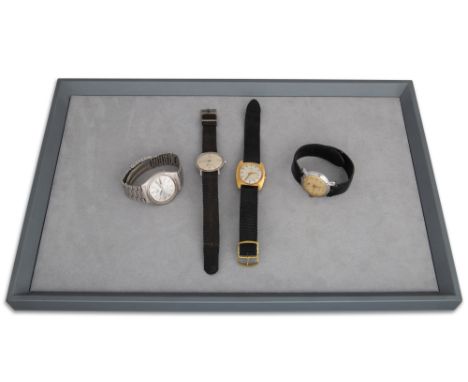 A COLLECTION OF FOUR WATCHES, comprising three vintage wristwatches, a Timex, silvered face, with baton markers and date and 