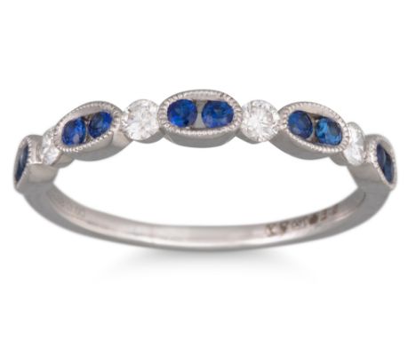 A DIAMOND AND SAPPHIRE SET BAND RING, the round brilliant cut diamonds set between pairs of sapphires, stamped in band: sapph