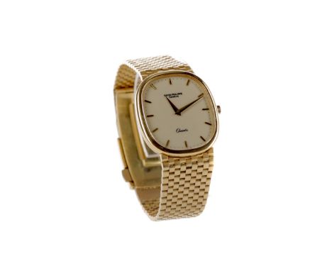 GENTLEMAN'S PATEK PHILIPPE ELLIPSE EIGHTEEN CARAT GOLD QUARTZ WRIST WATCH, the elliptical dial with applied gold coloured hou