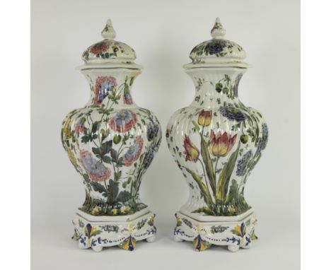 A pair of Le Nove (di Bassano) maiolica hexagonal fluted baluster vases, covers and stands with colourful decoration of flowe
