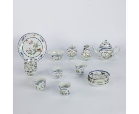 Chinese tea service constisting of 7 bowls, 6 saucers, 4 cups, a tea caddy with metal lid, a plate, a larger bowl and a teapo