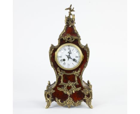 Beautiful Louis XV style table clock with a tortoiseshell case, richly decorated with gilt bronze mounts in rocaille style, 1