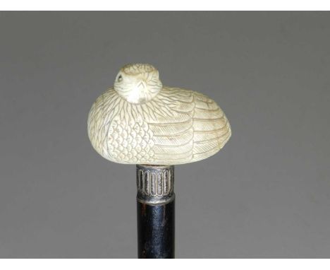 A Victorian carved ivory-topped and silver-mounted ebonised cane, the top carved as a partridge, the collar Sheffield and dat