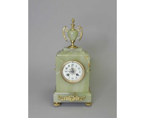 A French onyx and gilt metal mantel clock, circa 1900, with vase finial above a rectangular case with gilt metal flower decor