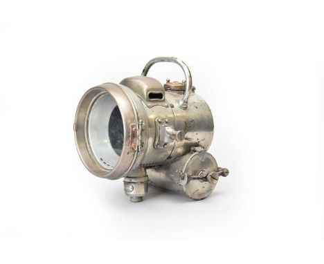 A Powell &amp; Hanmer chrome acetylene automobile lamp, with loop carrying handle and original removable burner reservoir, 23
