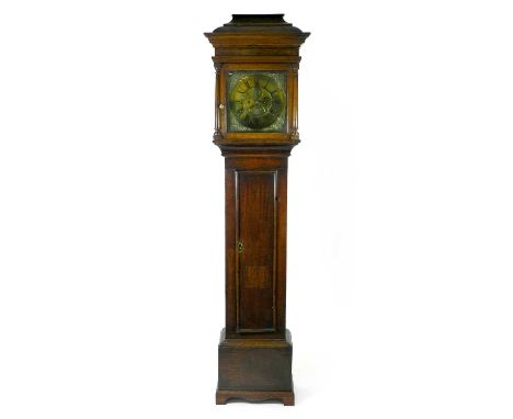 An 18th century provincial, oak 8-day longcase clock, the hood with a caddy top and enclosing a 12" square brass dial, signed