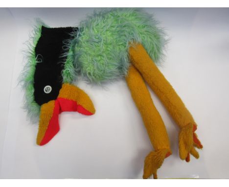 An emu soft toy with hand puppet head 