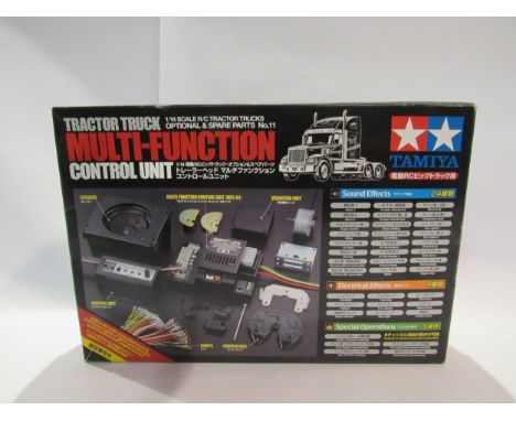 A boxed Tamiya 56511 Tractor Truck Multi-Function Control Unit for 1:14 scale radio control tractor trucks 