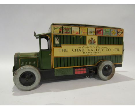 A Chad Valley, clockwork tinplate delivery van, 'CV10032' registration 