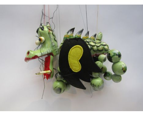 A Pelham Puppets Mother Dragon puppet in yellow card box 