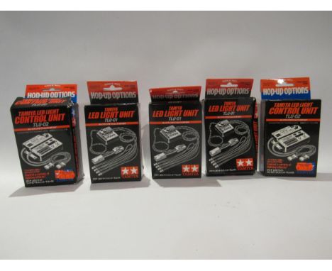 Three boxed Tamiya TLU-01 LED Light Units and two TLU-02 LED Light Control Units, all for radio control touring cars (5) 