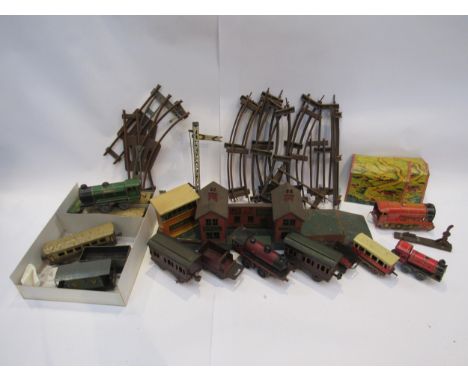 A collection of 0 gauge model railway items including Marklin for Gamages locomotive (a/f) and tender, passenger coaches and 