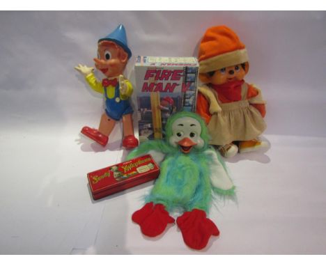 Assorted vintage toys including Sooty Junior Xylophone, battery operated Fire Man V, Orville the Duck, Pinnochio and Chad Val