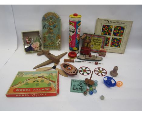 Mixed vintage toys including spinning tops, Tri-ang Wakouwa dog with stick (a/f), Circus bagatelle game etc. 