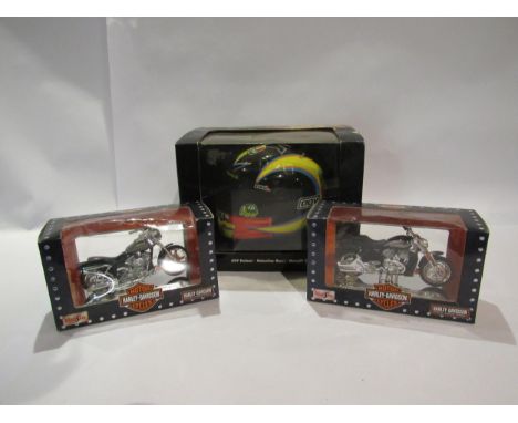 A boxed Minichamps 1:2 scale Valentino Rossi AGV Helmet together with two boxed Maisto Harley-Davidson motorcycles (3) 