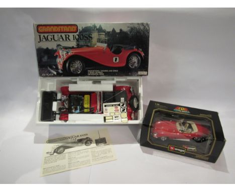 A boxed Grandstand 1:10 scale radio control Jaguar 100SS and a Burago 1:18 scale diecast Jaguar E Cabriolet (2) 