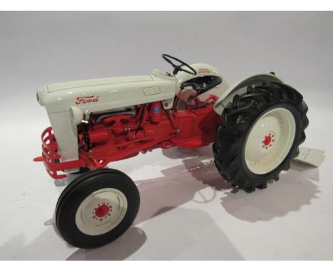 A Franklin Mint 1:12 scale diecast 1953 Ford tractor, unboxed 