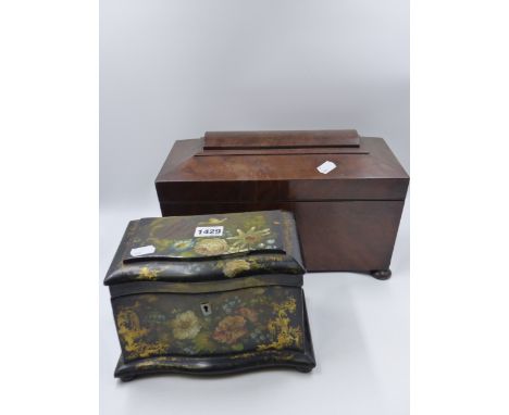 A VICTORIAN PAPIER MACHE SERPENTINE FRONT FLORAL AND GILT DECORATED TEA CADDY WITH TWIN COMPARTMENT INTERIOR ON BUN FEET TOGE