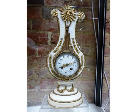 AN ANTIQUE FRENCH WHITE MARBLE ORMOLU MOUNTED LYRE FORM CLOCK IN THE LOUIS XV STYLE.   H.41cms.