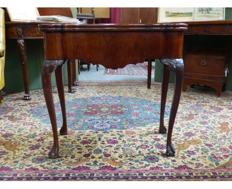 A LATE 18th.C.CARVED MAHOGANY GAMES TABLE WITH UNUSUAL HINGED TOP OPENING TO REVEAL FITTED INTERIOR, DISHED PLAYING SURFACE W