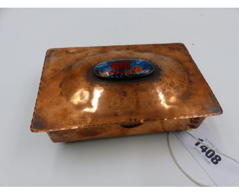 AN ARTS AND CRAFTS COPPER LIFT TOP DRESSER BOX WITH ENAMEL OVAL INSET TO TOP, BALL FEET.   W.14.5cms.