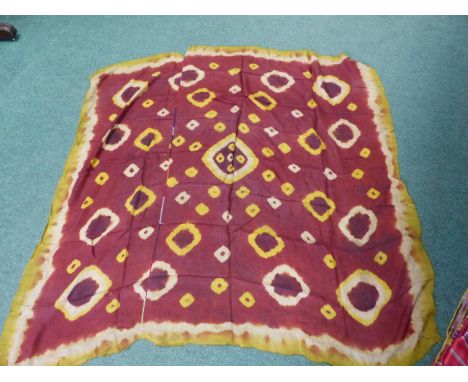 A GROUP OF BALINESE WOVEN AND TIE DIED TEXTILES.