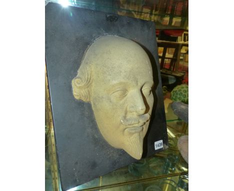 A DEATH MASK PORTRAIT OF WILLIAM SHAKESPEARE MOUNTED ON A SLATE SLAB.     OVER ALL     38 x 30.5cms.