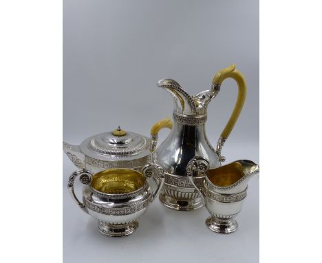 A SILVER FOUR PIECE TEASET COMPRISING A TEAPOT, HOT WATER POT, TWO HANDLED SUCRIER AND CREAM JUG. LONDON 1929 & 1930, MAKERS 