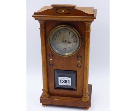 AN EARLY 20th.C.MANTLE CLOCK OF SECESSIONIST DESIGN, WALNUT CASE WITH INLAID GEOMETRIC MOTIFS.   H.26cms.