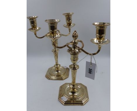 A PAIR OF SILVER TWO BRANCH TALL CANDELABRA WITH SQUARE CANTED BASES AND TAPERED COLUMNS, SHEFFIELD 1907.   H.30cms.