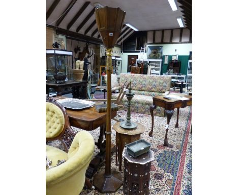 AN ART DECO WALNUT FLOOR LAMP OR UPLIGHTER WITH CARVED GILT COLLAR, TAPERED FORM WITH OCTAGONAL BASE.   H.186cms.