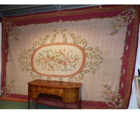 A LARGE NEEDLEPOINT CARPET OF FRENCH AUBUSSON DESIGN.