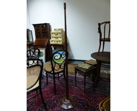 AN ART DECO INLAID MAHOGANY TAPERED FORM FLOOR LAMP ON OCTAGONAL  BASE WITH CARVED ACORN MARK.   H.163cms.