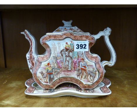 A BURGESS & LEIGH WARE TEAPOT AND STAND DECORATED WITH AN INDIAN PATTERN.  (2)