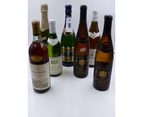 A MIXED LOT OF SEVEN BOTTLES TO INCLUDE SPARKLING AND GERMAN WINE.