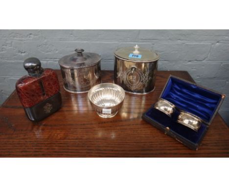 A Victorian oval electroplate tea caddy, with hinged cover, lock and key, crested, another similar tea caddy, Edwardian spiri