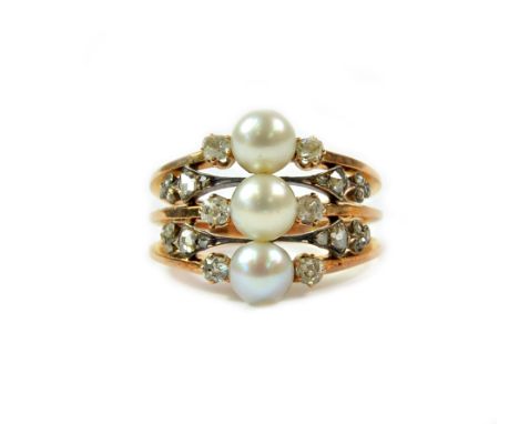 A pearl and diamond ring, French, early 20th century, formed as three beads between pairs of old-cut diamonds, Linzeler & Fil