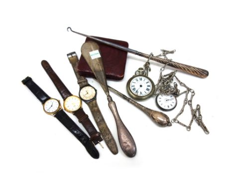 A Victorian silver handled steel button hook, London 1868, another and a shoe horn, a Victorian silver cased fob watch, Londo