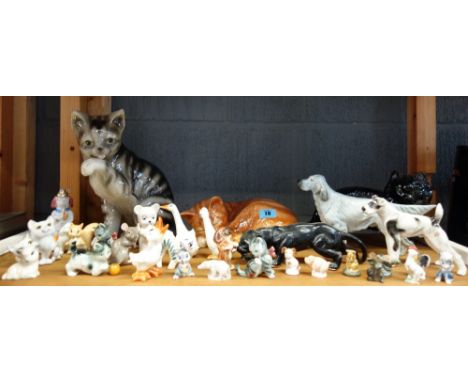 Two large Goebel figures of cats, and a large collection of German and other figures of animals. (qty)