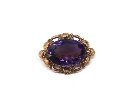 An amethyst set single stone ring, claw set with an oval cut amethyst, ring size K and a half. 