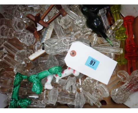A large collection of Victorian and early 20th century glass knife rests, four pairs in coloured glass, twenty two pairs in c