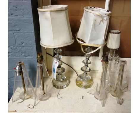 A pair of Art Deco style faceted and chromium mounted table lamps, mid 20th century, 37.5cm high, together with a set of four